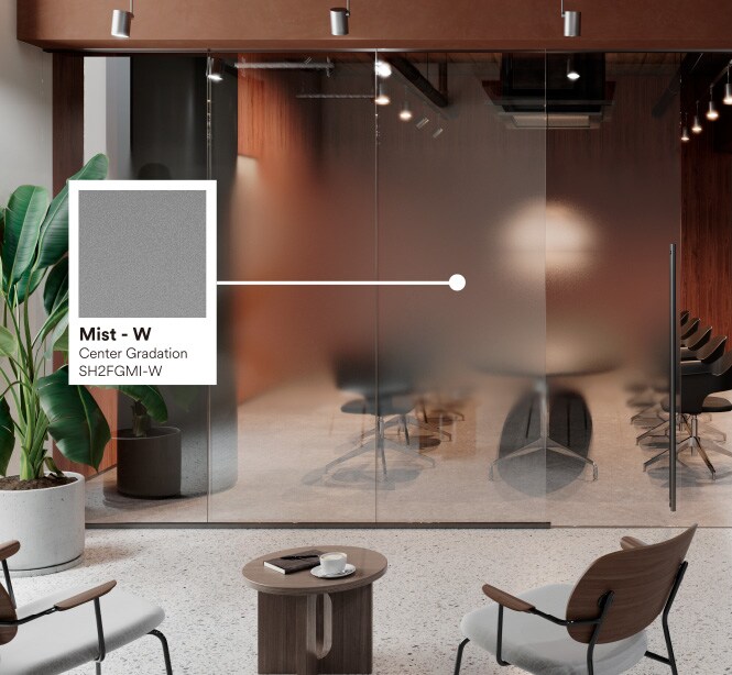 Ufficio con colori caldi, pavimenti in pietra e verde con didascalia della finitura Mist.
