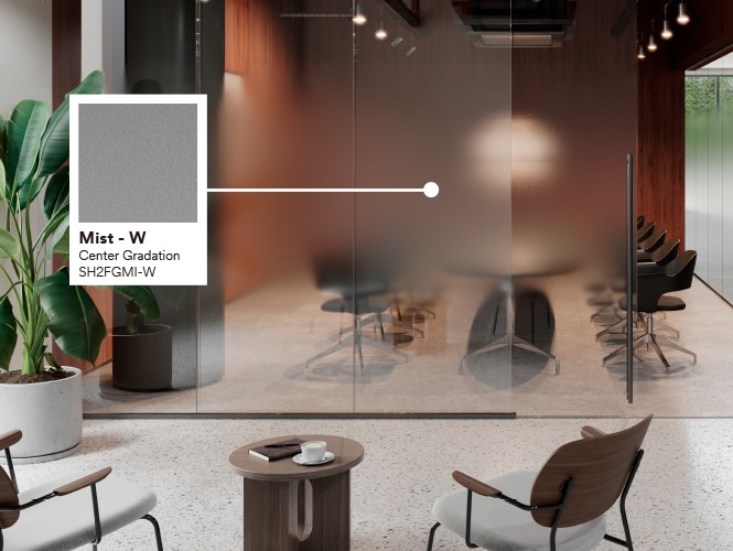 Ufficio con colori caldi, pavimenti in pietra e verde con didascalia della finitura Mist.

