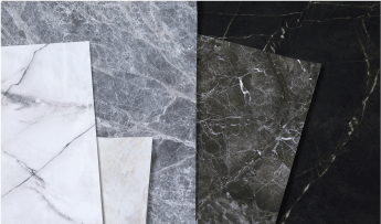 Vari laminati adesivi con aspetto e sensazione al tatto che richiamano la pietra

