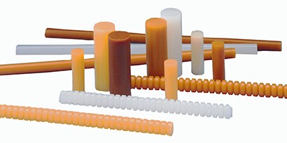 Gli adesivi a caldo solidi vengono applicati allo stato liquido e formano un legame quando si raffreddano e induriscono. Immagine di adesivi a caldo solidi.
