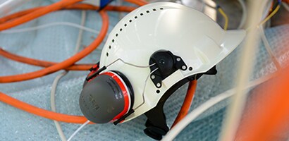 Strumento di selezione dell'attacco del casco di sicurezza

