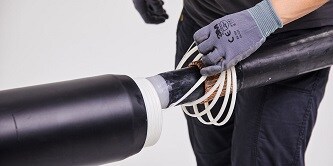 Immagine di applicazione di cavi di alimentazione con tecnologia autorestringente
